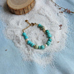 Braccialetto con Turchese e pietre varie, perle coltivate, acciaio oro