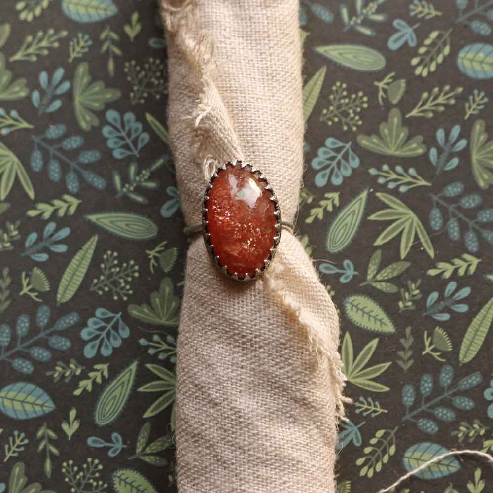 Anello "Aurora di Fuoco" Pietra del sole in argento - Regolabile